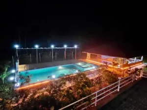 Nysa Estate luxury pool villa coorg pool side evening