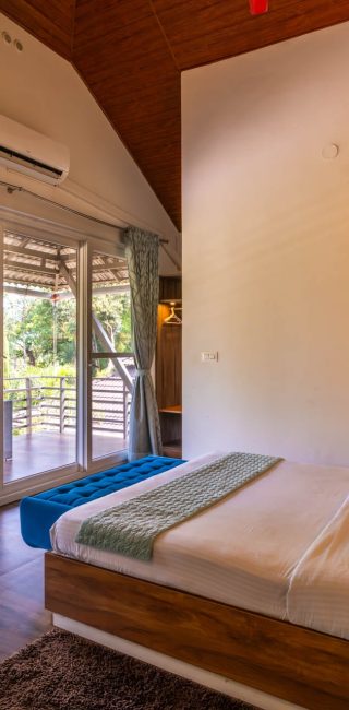 Nysa-Estate-5-bhk-luxury-villa-in-coorg-with-private-pool-and-spacious-rooms-bedroom-balcony-view