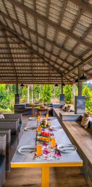 Nysa-Estate-5-bhk-luxury-villa-in-coorg-with-private-pool-and-spacious-rooms-poolside-dining-setup